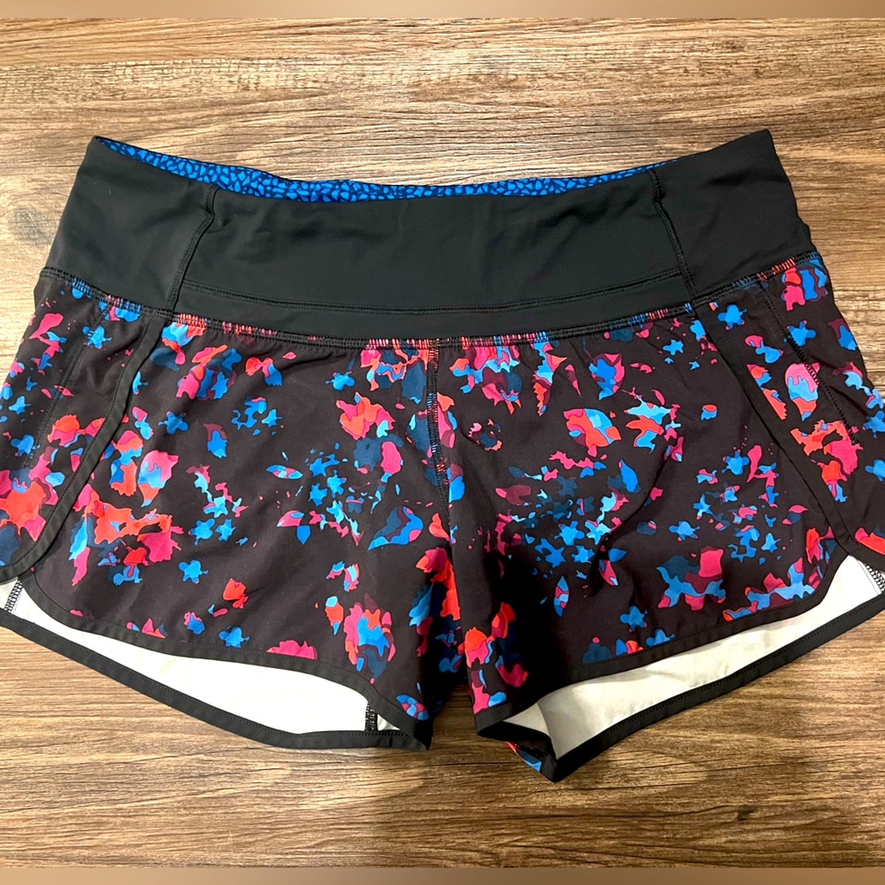 Pink, blue, and black Lululemon shorts